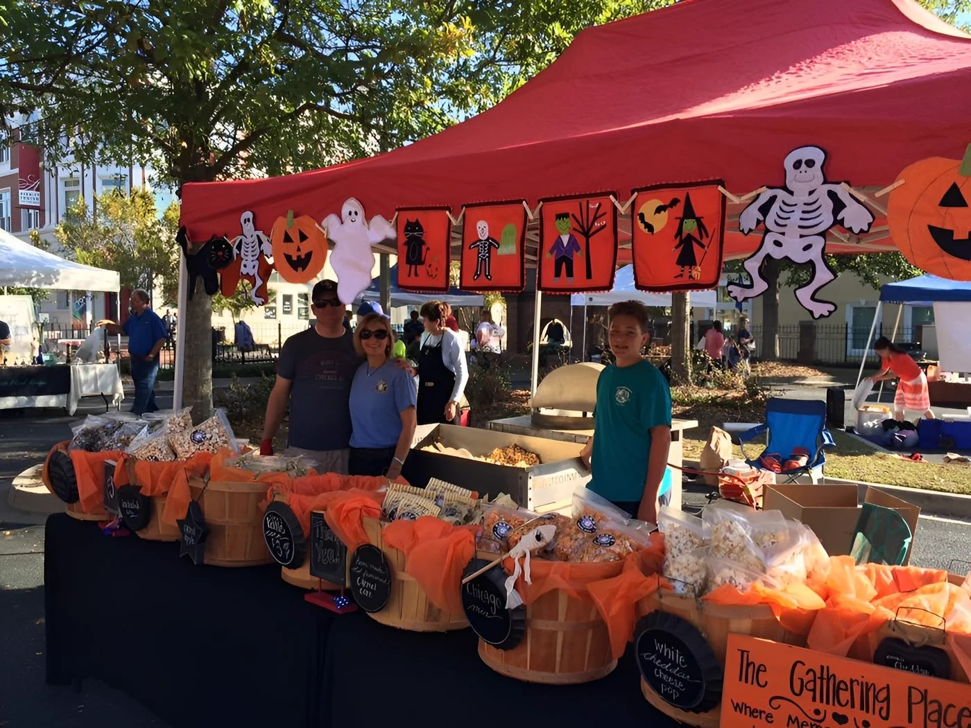 The Corks Popcorn booth at the market, decorated for Halloween